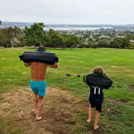 Family life outdoors: a photograph from the Greenwave archive — M488
